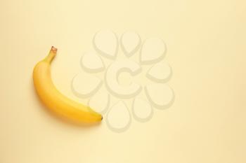 Ripe banana on color background�