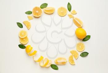 Frame made of ripe lemons on white background�