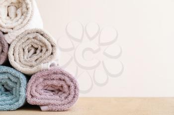 Soft clean towels on light background�
