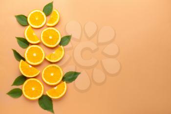 Fresh orange slices on color background�
