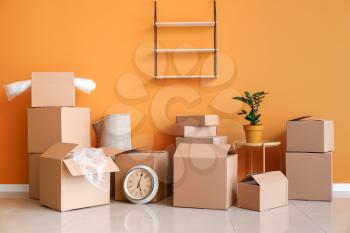 Cardboard boxes with belongings in new flat on moving day�