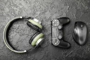 Modern gaming accessories on grunge background�