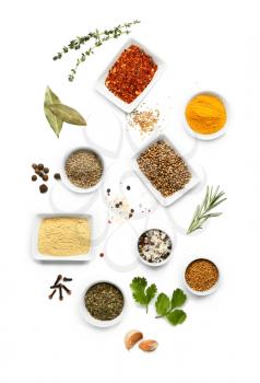 Many different spices on white background�