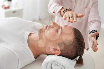 Reiki master working with patient�