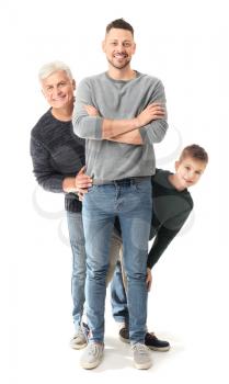 Man with his father and son on white background�