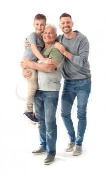 Man with his father and son on white background�