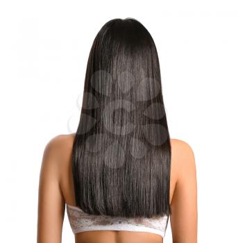 Young Asian woman with beautiful long hair on grey background�