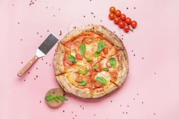 Delicious pizza Margherita on color background�