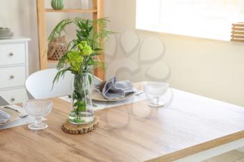 Floral decor on table in dining room�