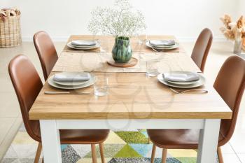 Served table in modern dining room�