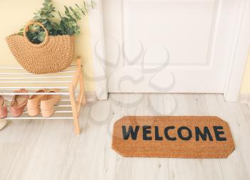 Door mat on floor in hallway�