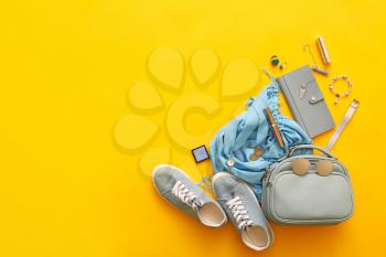 Female accessories on color background�