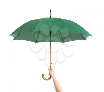 Hand with stylish umbrella on white background�
