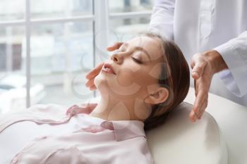 Reiki master working with patient�