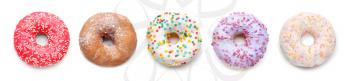 Sweet tasty donuts on white background�