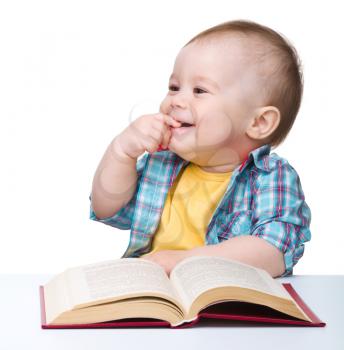 Royalty Free Photo of a Little Boy With a Book