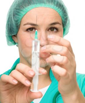 Royalty Free Photo of a Nurse With a Syringe