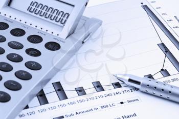 Close up of a calculator, Business  Chart and pen. 