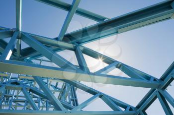 New residential construction home metal framing  against a blue sky