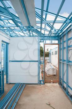 New home under construction using steel frames with insulation