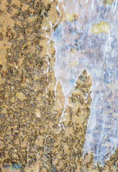 old gray stone  wall with water splash for design backgrounds
