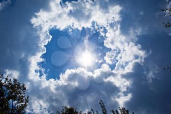 Royalty Free Photo of a Cloudy Sky With the Sun Breaking Through