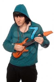 Royalty Free Photo of a Guy With a Toy Guitar