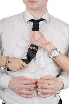 Royalty Free Photo of a Man With a Woman's Hands on His Tie
