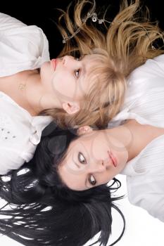 Royalty Free Photo of Two Girls Lying Down