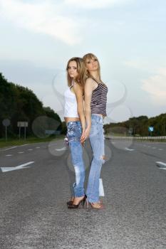 Royalty Free Photo of Two Women on a Road