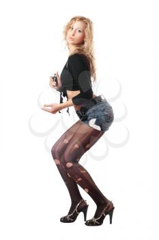 Royalty Free Photo of a Woman in Ripped Stockings Holding a Bottle