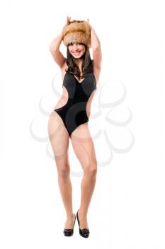 Royalty Free Photo of a Woman in a Fur Hat and Black Swimsuit