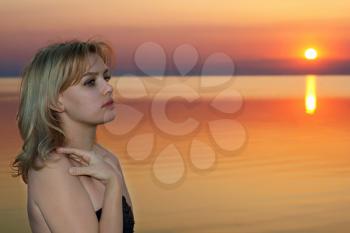 Royalty Free Photo of a Woman and a Sunset