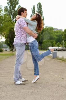 Couple of playful young people on the street