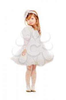 Adorable little girl in a white dress. Isolated
