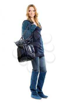 Young woman in a jeans. Isolated on white