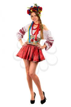 Smiling young woman in the Ukrainian national clothes. Isolated