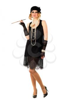 Young woman with a cigarette holder dressed in retro style. Isolated