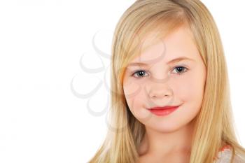 Portrait of little blond girl with charming smile. Isolated on white