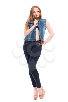 Beautiful blond woman posing in casual clothes. Isolated on white
