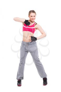 Attractive blond woman wearing sport clothes. Isolated on white