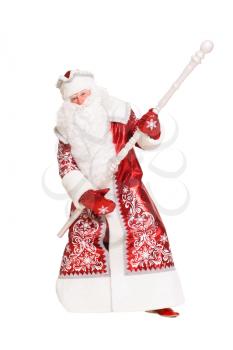 Playful Santa Claus posing with a staff. Isolated on white