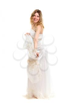 Playful young smiling blonde posing in white wedding dress. Isolated