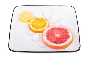 Grapefruit, orange and lemon. Isolated on white