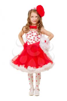 Beautiful little girl posing in red and white lace dress with big bow. Isolated