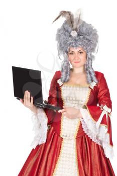 Portrait of a woman in queen dress with laptop. Isolated on white