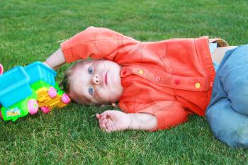 Royalty Free Photo of a Little Boy Playing Outside