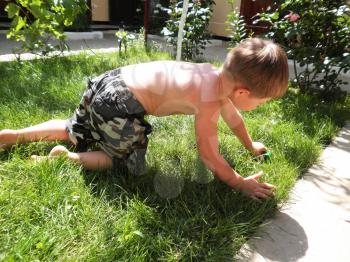 Royalty Free Photo of a Little Boy Playing