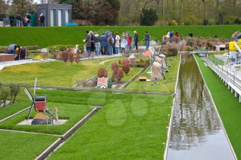 THE HAGUE, NETHERLANDS - APRIL 7: Visiting tourists Madurodam exposition updated April 7, 2012 in Den Haag, The Netherlands