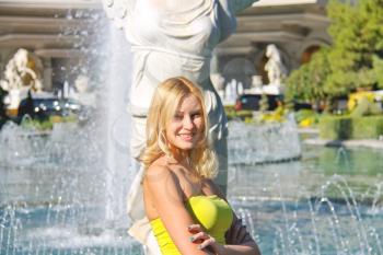 Vacation in Las Vegas. Girl on background of the fountain.